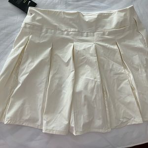 Nike cream pleated skort